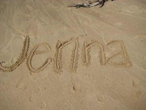 Jenna written in sand   